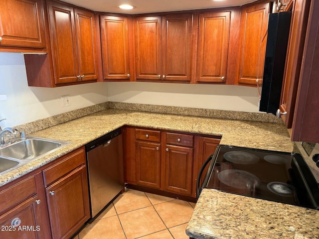 kitchen featuring stainless steel dishwasher, electric range, light countertops, a sink, and light tile patterned floors