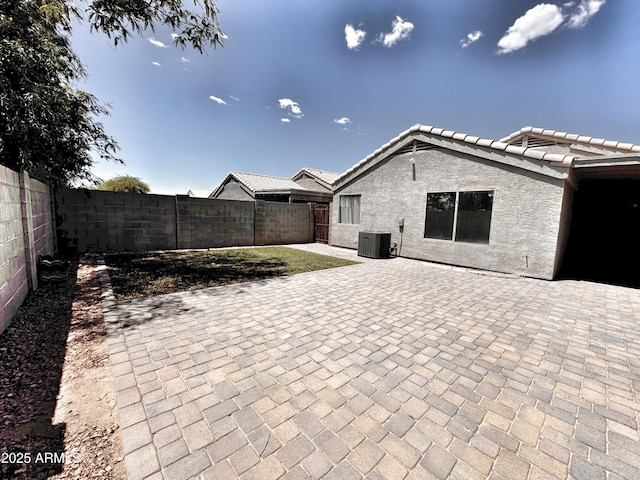 view of patio / terrace featuring a fenced backyard and cooling unit