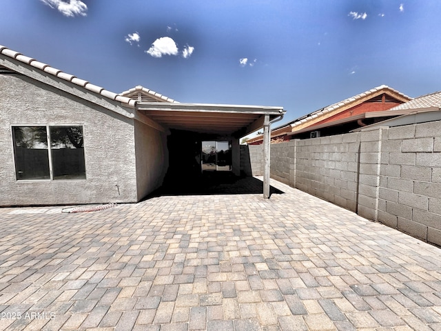 view of patio / terrace with fence