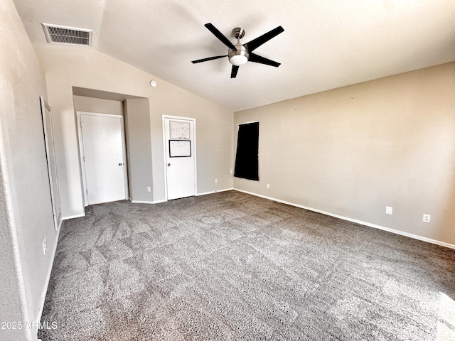 unfurnished bedroom with lofted ceiling, carpet floors, baseboards, and a ceiling fan