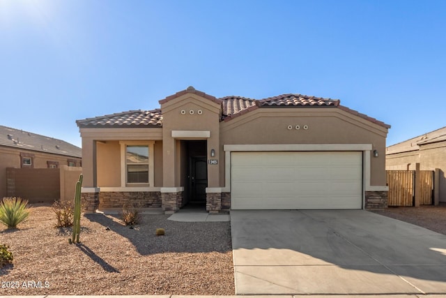 view of front of home with a garage