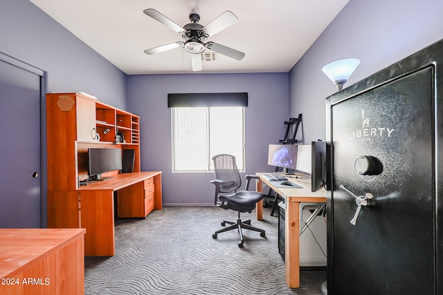 carpeted home office with ceiling fan