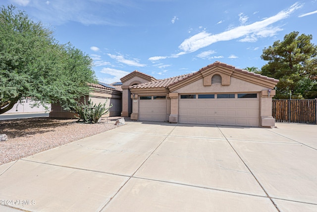 view of front of property featuring a garage