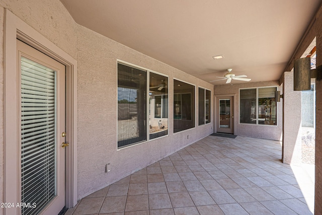 view of patio featuring ceiling fan