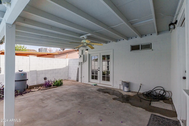 view of patio with a ceiling fan, french doors, and fence