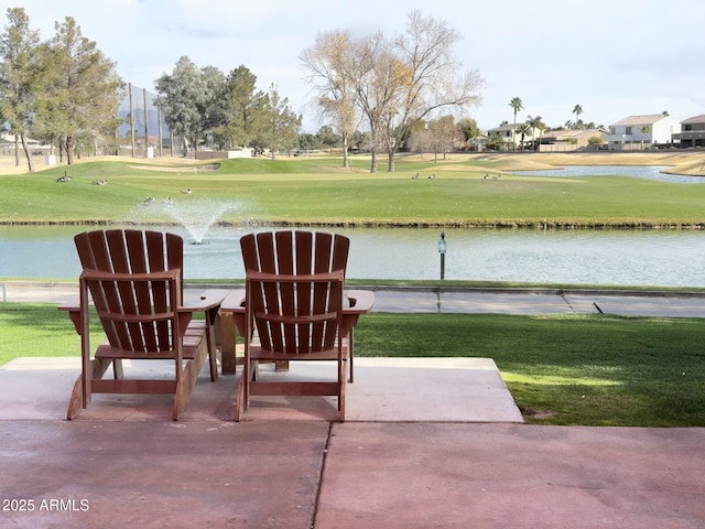 view of patio featuring a water view