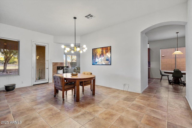 dining space featuring a chandelier