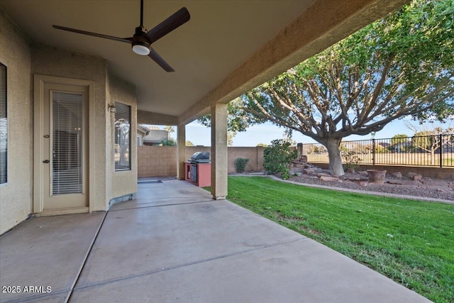 view of patio / terrace featuring ceiling fan