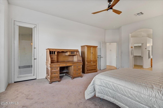 carpeted bedroom featuring access to outside and ceiling fan