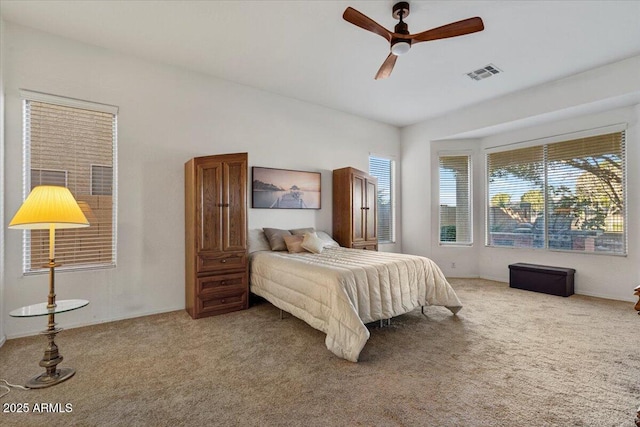 bedroom featuring ceiling fan and carpet floors