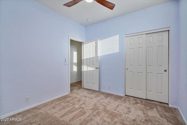 9758 E Meseto Ave, Mesa, AZ 85209 - unfurnished bedroom featuring ceiling fan, light carpet, and a closet