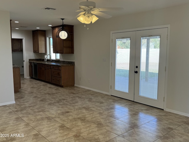 kitchen featuring sink, french doors, and ceiling fan