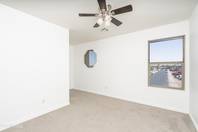 12424 N B St, El Mirage, AZ 85335 - spare room featuring carpet, baseboards, and ceiling fan