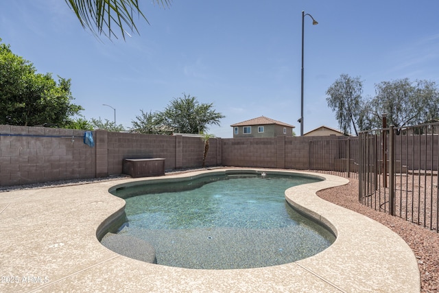 12424 N B St, El Mirage, AZ 85335 - view of swimming pool with a fenced backyard
