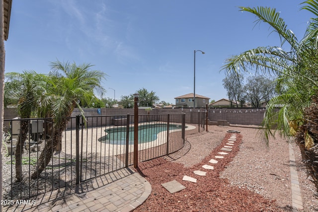 12424 N B St, El Mirage, AZ 85335 - view of swimming pool with a fenced backyard and a patio area