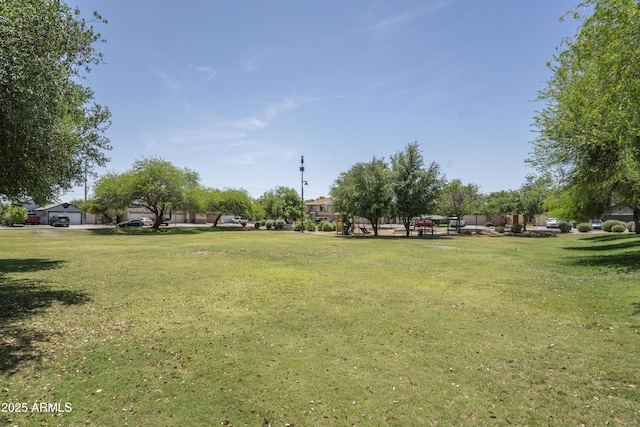 12424 N B St, El Mirage, AZ 85335 - view of home's community featuring a lawn