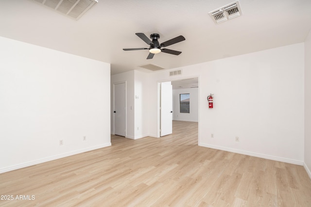 12424 N B St, El Mirage, AZ 85335 - empty room featuring a ceiling fan, light wood finished floors, and baseboards