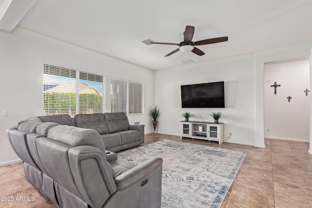 living room with light tile patterned flooring and ceiling fan