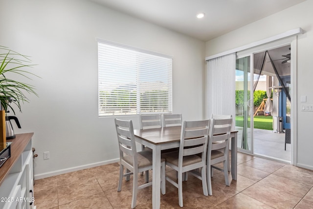 dining space with light tile patterned flooring