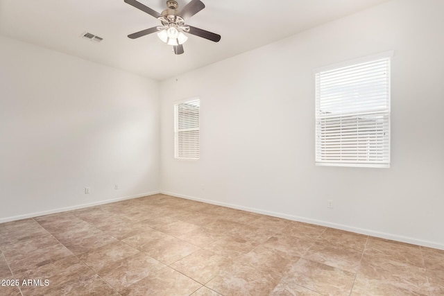 empty room featuring ceiling fan