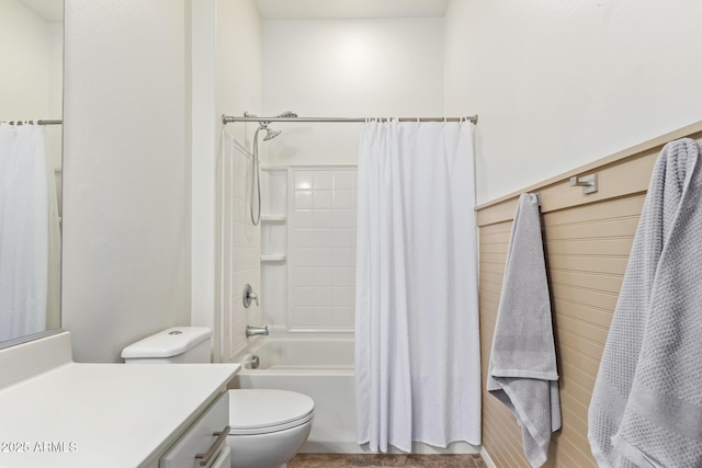 full bathroom with vanity, toilet, and shower / bath combo with shower curtain