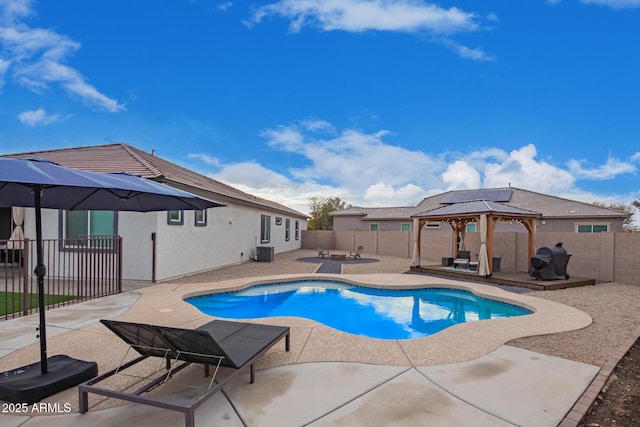 view of swimming pool with a gazebo, a patio area, and central air condition unit