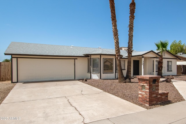 ranch-style home featuring a garage