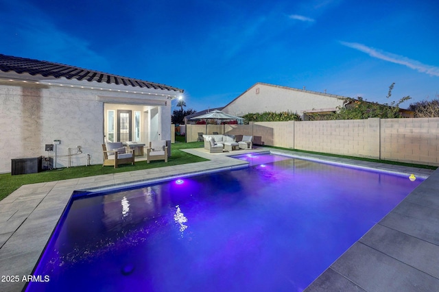 view of pool with an outdoor hangout area, an outdoor structure, and a patio