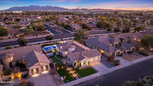 aerial view at dusk with a mountain view