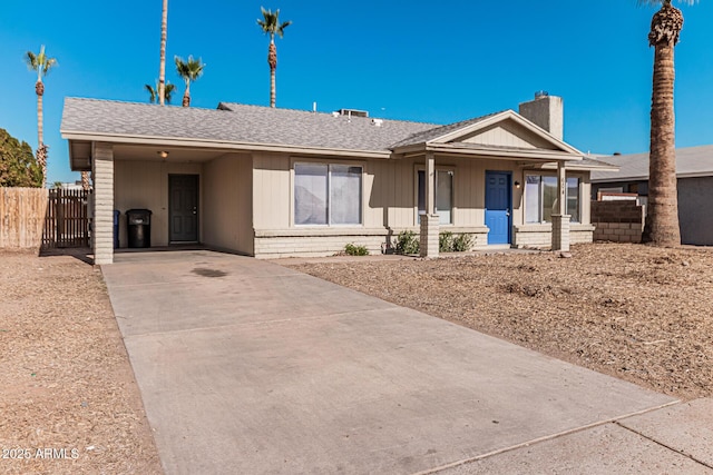 ranch-style home with a carport