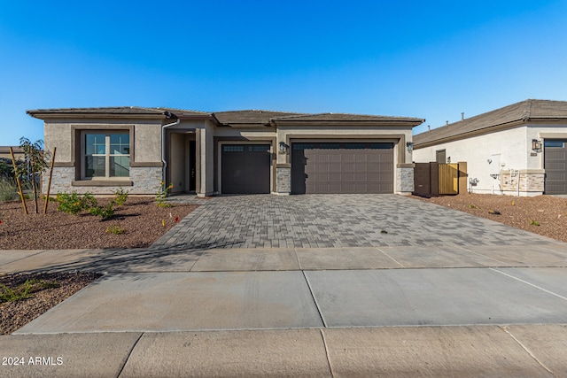 prairie-style home with a garage