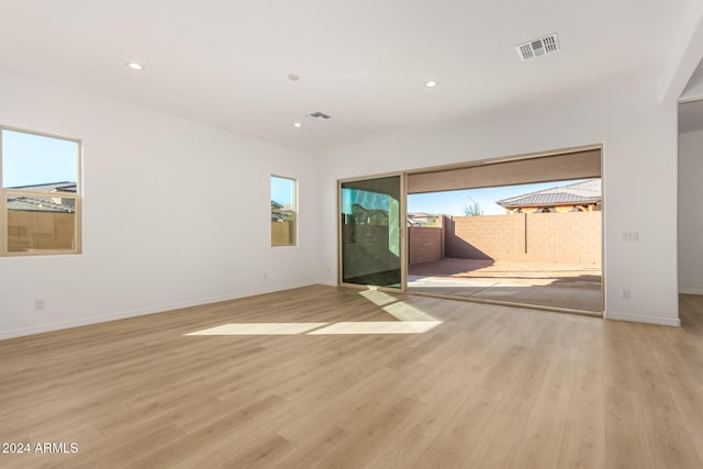 empty room with light wood-type flooring