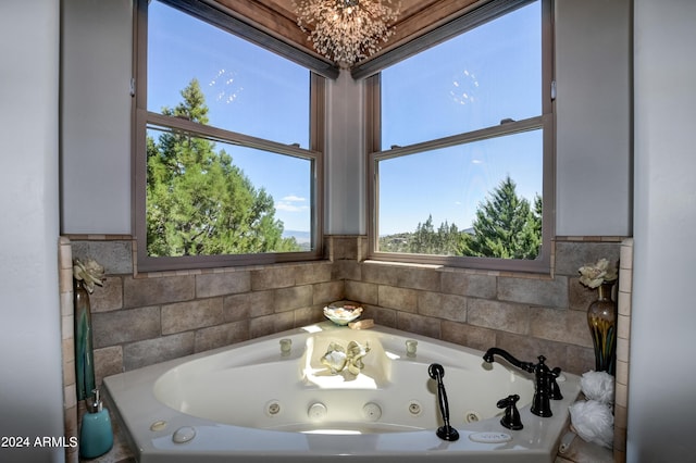 bathroom featuring a chandelier