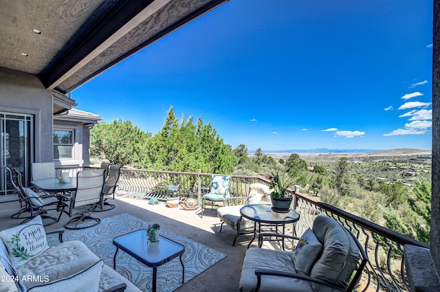 view of patio / terrace featuring a balcony