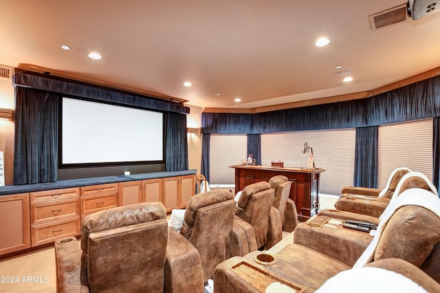 home theater featuring light carpet