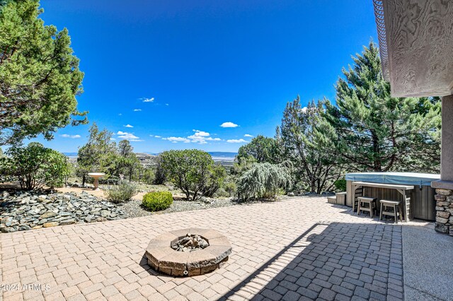 view of patio featuring a hot tub