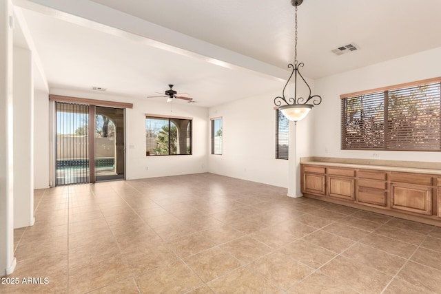 spare room featuring ceiling fan