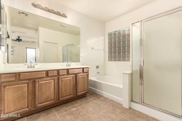 bathroom featuring ceiling fan, vanity, tile patterned floors, and shower with separate bathtub