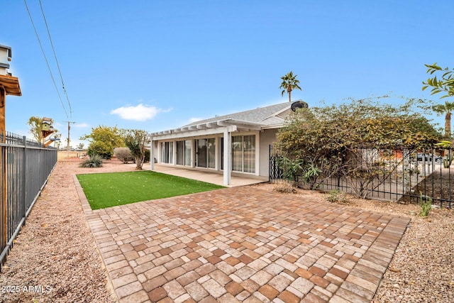 rear view of property with a patio