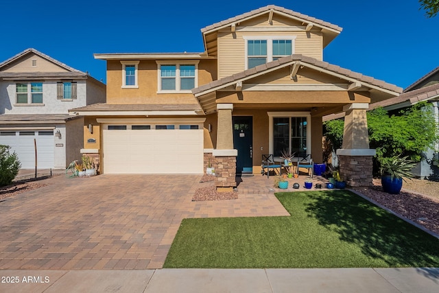 5012 S Girard St, Gilbert, AZ 85298 - craftsman-style home with a tiled roof, a porch, a garage, stucco siding, and decorative driveway