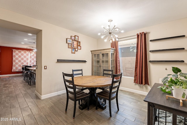 5012 S Girard St, Gilbert, AZ 85298 - dining space featuring baseboards, recessed lighting, a notable chandelier, and wood finished floors