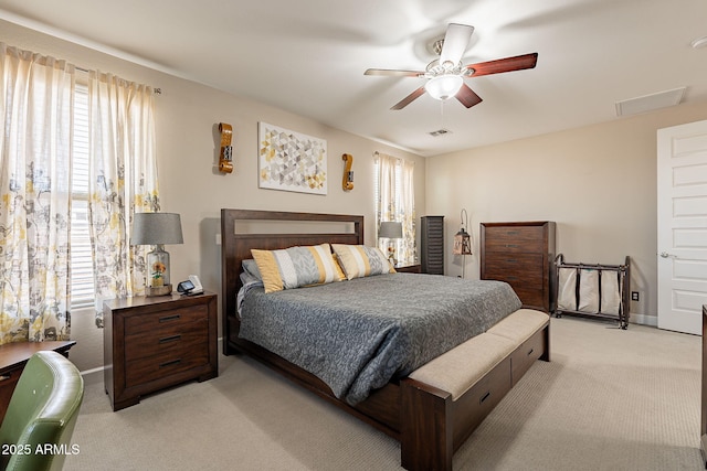 5012 S Girard St, Gilbert, AZ 85298 - bedroom featuring visible vents, ceiling fan, light colored carpet, and baseboards