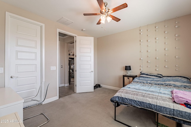 5012 S Girard St, Gilbert, AZ 85298 - bedroom with visible vents, light colored carpet, baseboards, and a ceiling fan