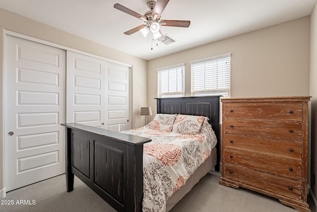5012 S Girard St, Gilbert, AZ 85298 - carpeted bedroom featuring visible vents, a closet, and a ceiling fan