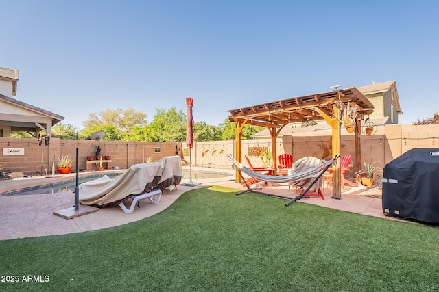 5012 S Girard St, Gilbert, AZ 85298 - view of yard with a patio area, a fenced backyard, a fenced in pool, and a pergola