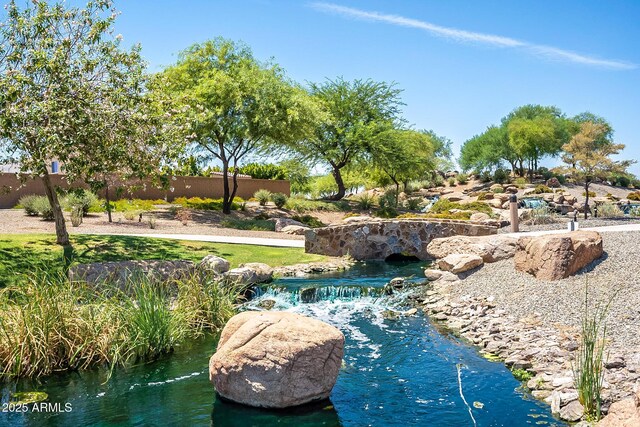 5012 S Girard St, Gilbert, AZ 85298 - view of pool featuring a garden pond