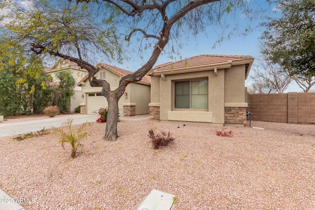 view of front of property featuring a garage