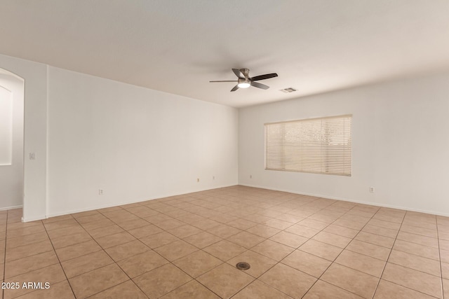 unfurnished room featuring ceiling fan