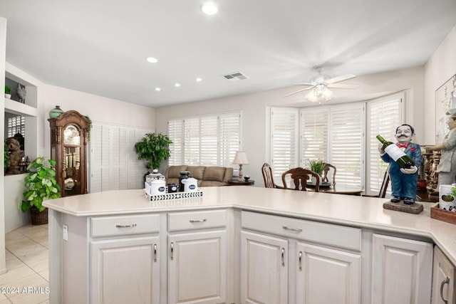 kitchen with white cabinetry, visible vents, ceiling fan, light countertops, and recessed lighting