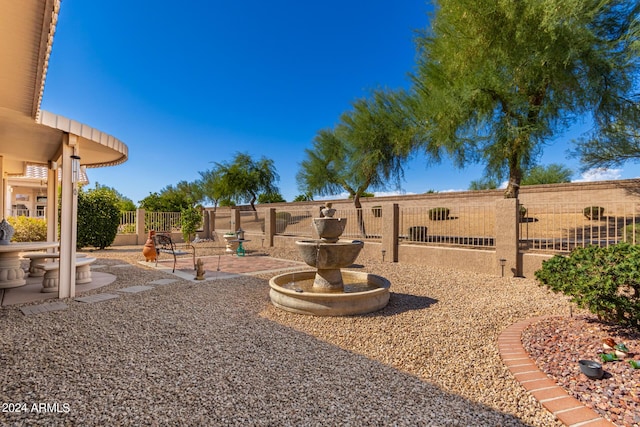 view of yard with fence and a patio area